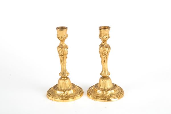 Two bronze candlesticks