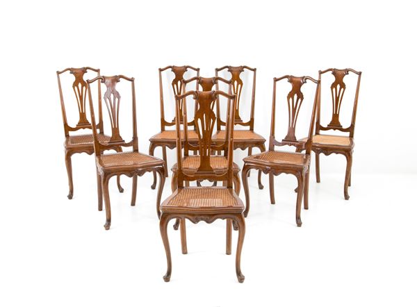 Eight walnut chairs