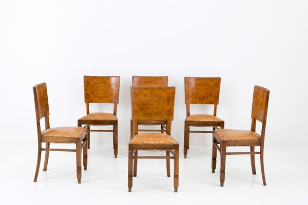 Six veneer chairs