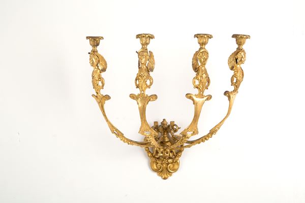 Applique in bronzo dorato