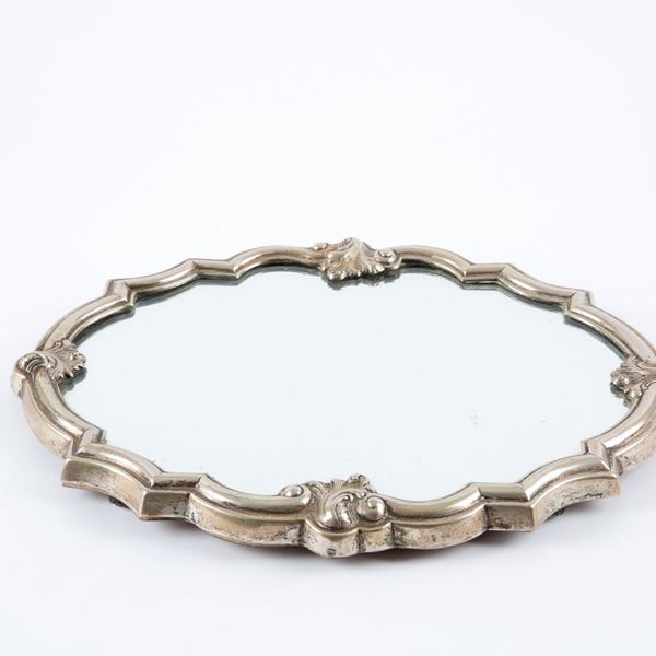 Silver centerpiece with mirror