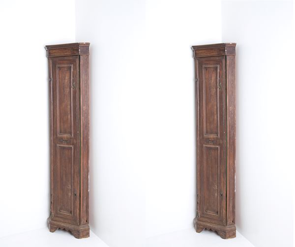 Pair of corner cupboards