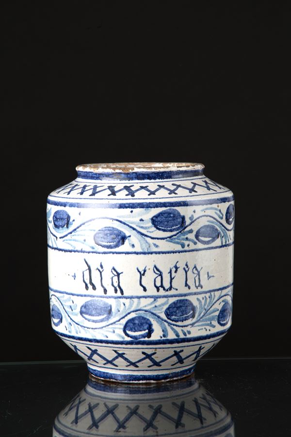 White and blue pharmacy jar