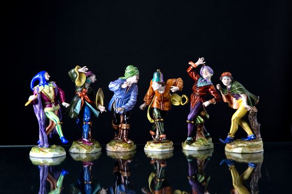 Six "DANCING CHARACTERS" statuettes