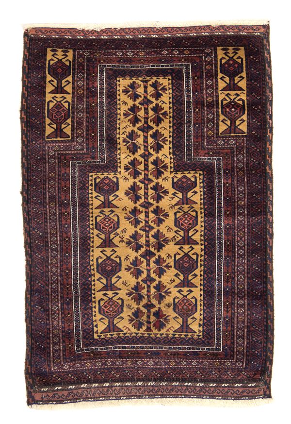 Baluch rug with prayer design. Persia