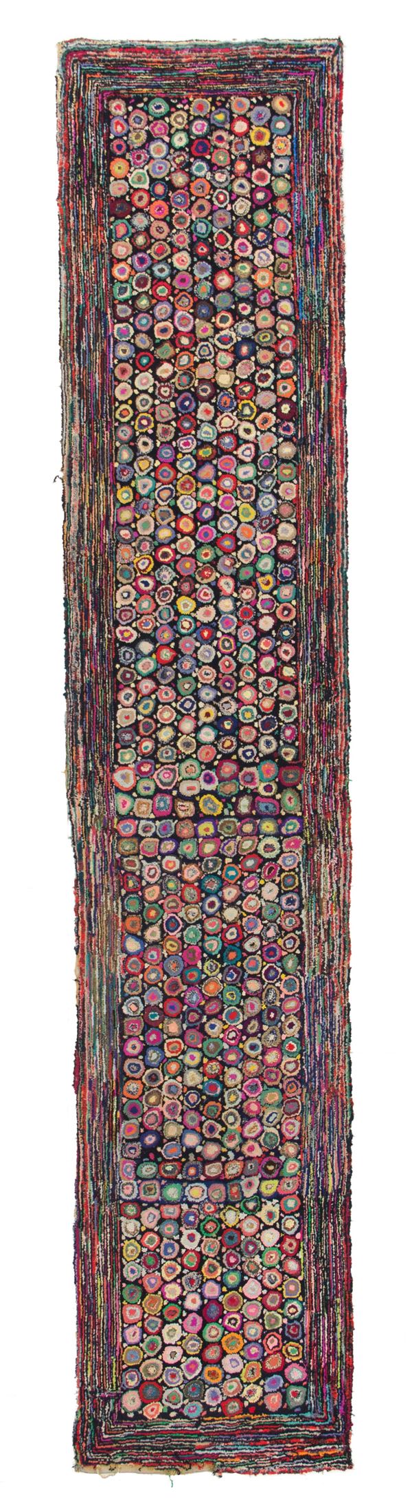Hook rug in wool and various fabrics. United States