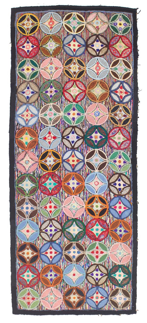 Hook rug in wool and various fabrics. United States
