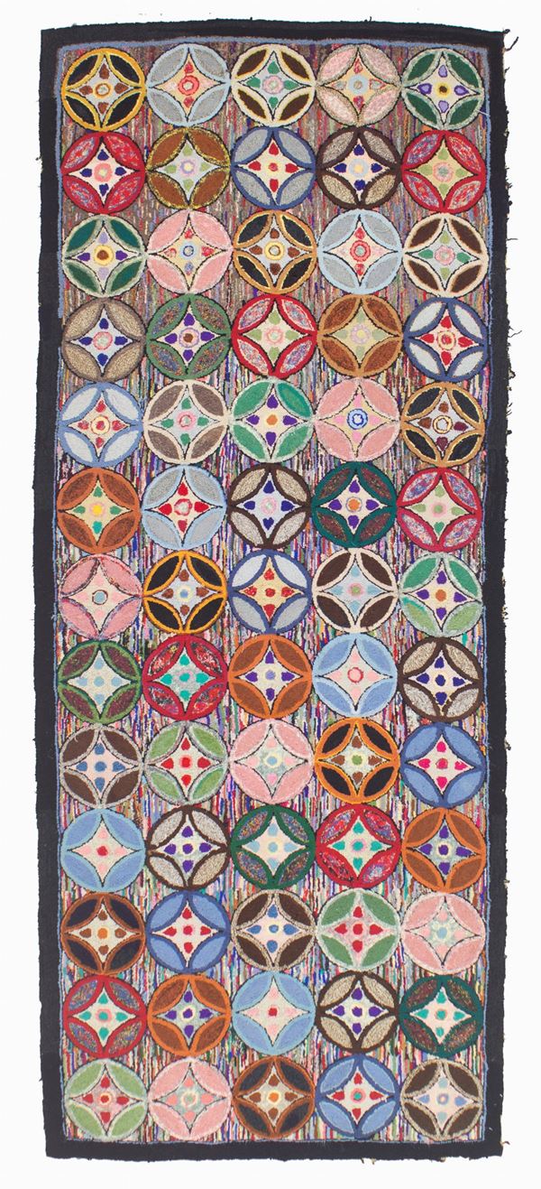 Hook rug in wool and various fabrics. United States