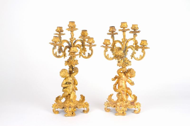 Coppia di candelabri in bronzo