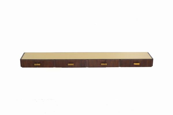 Consolle pensile in legno a dentelli