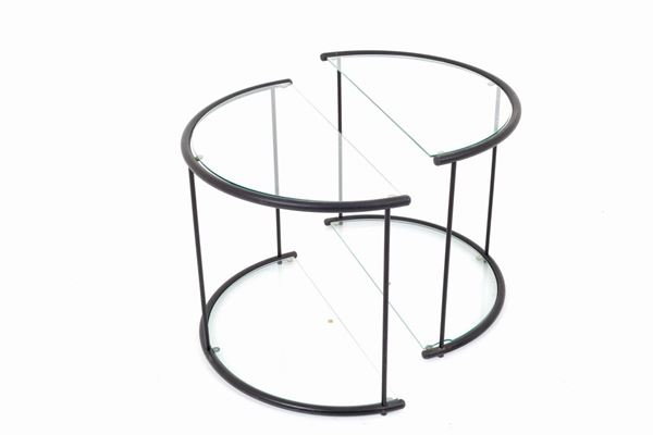 Pair of glass half-moon bedside tables