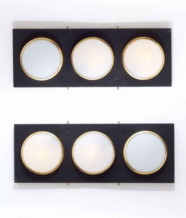 Two ceiling lights with three spotlights