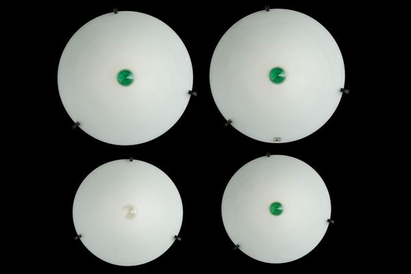 Four milk glass ceiling lights with tips