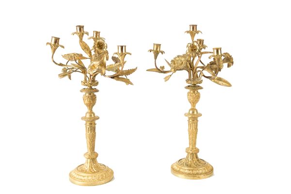 Due candelieri trasformabili in candelabri