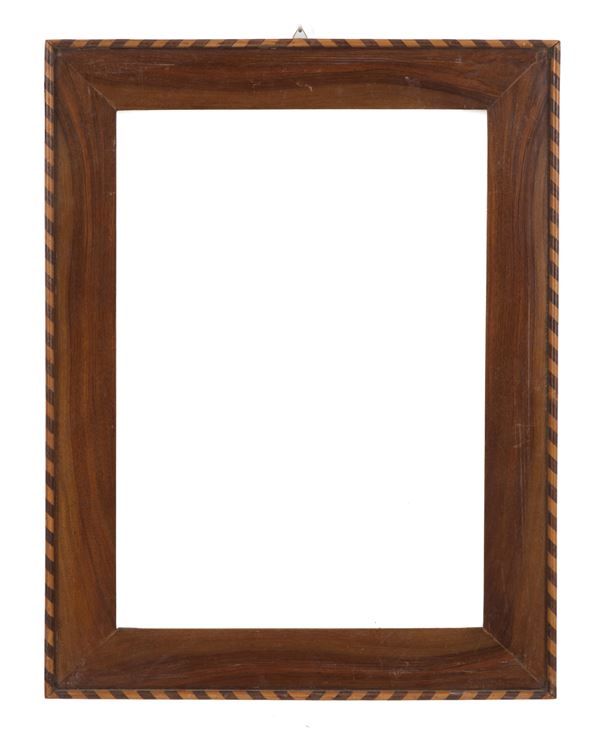 Cornice con profili in legno di testa