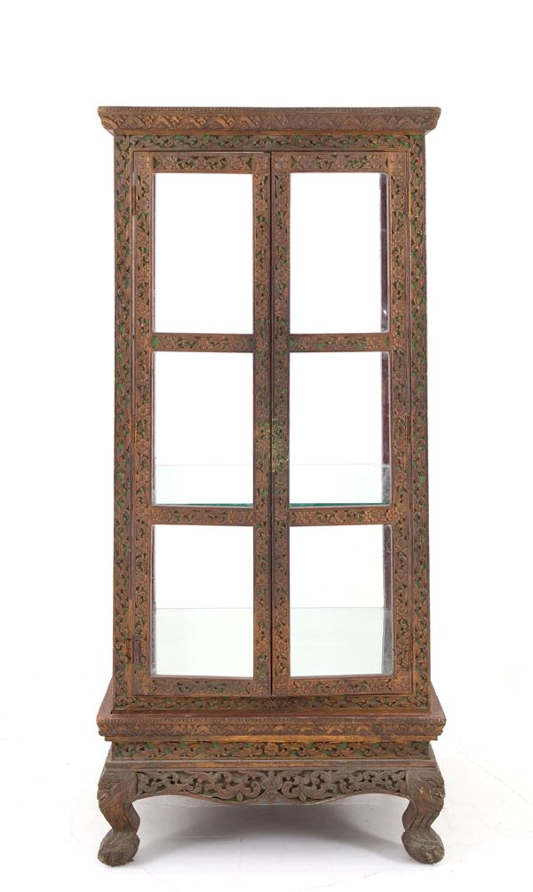 Carved and gilded wooden display case