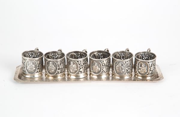 Tray with six silver glasses