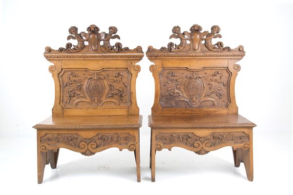 Pair of carved benches