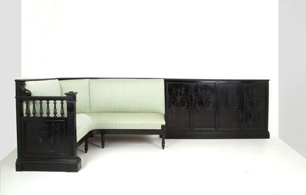 Divano angolare con boiserie