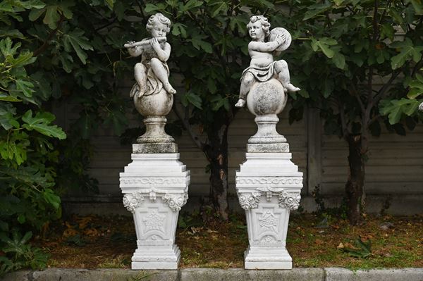 Pair of sculptures "PUTTI PLAYERS"