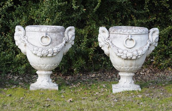 Pair of vases with garlands and masks