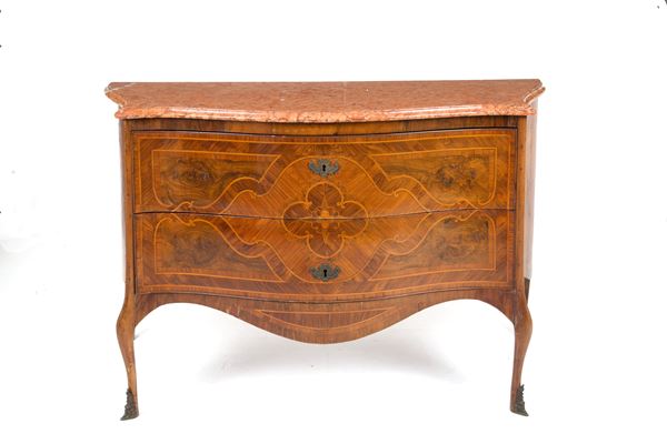 Curved chest of drawers with red marble top