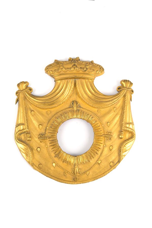 Plaque in the form of a gilded copper cloth