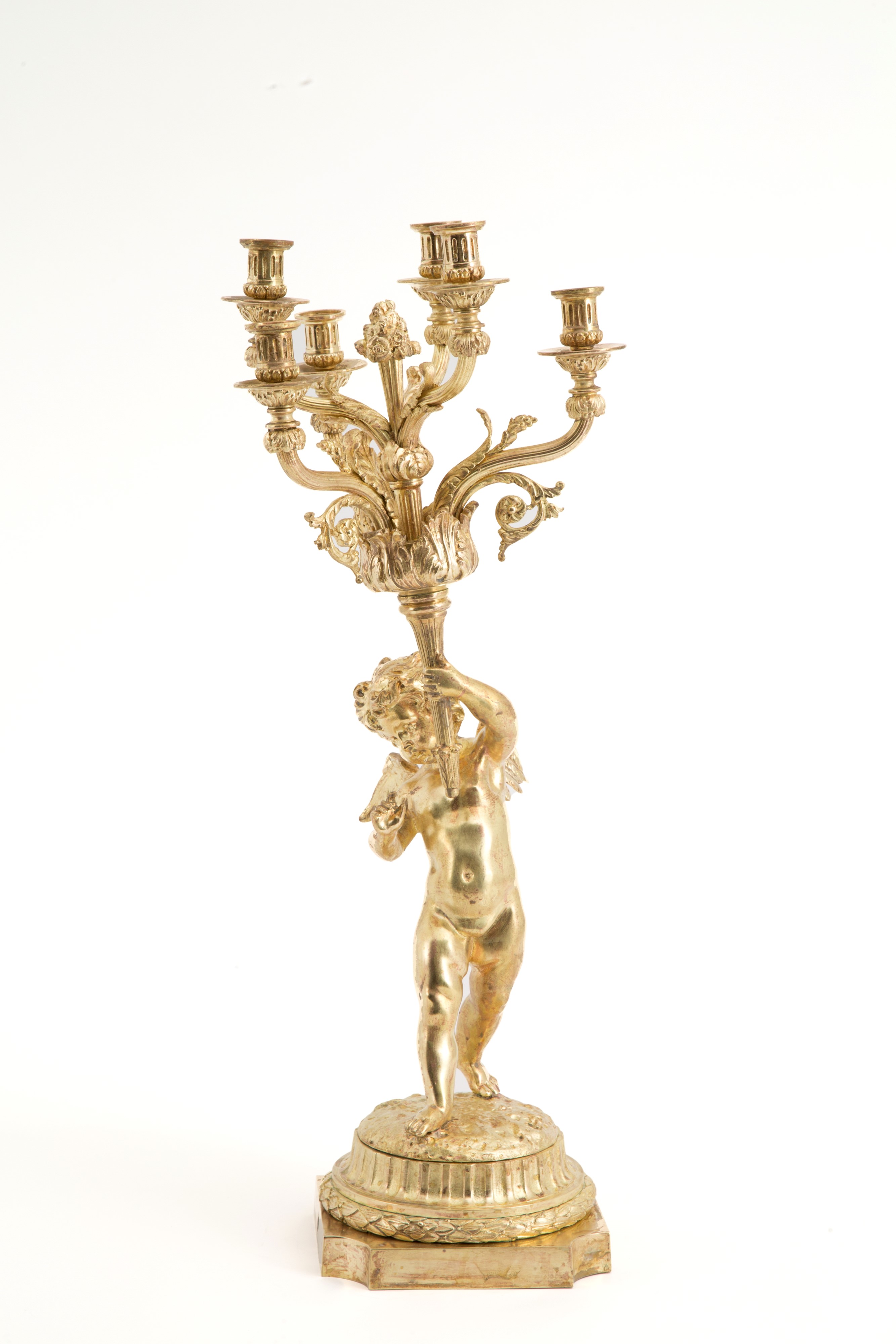 Candelabro con putto in bronzo dorato