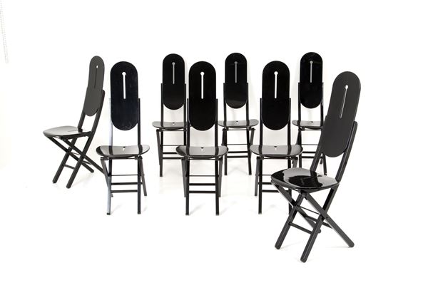 Eight folding chairs