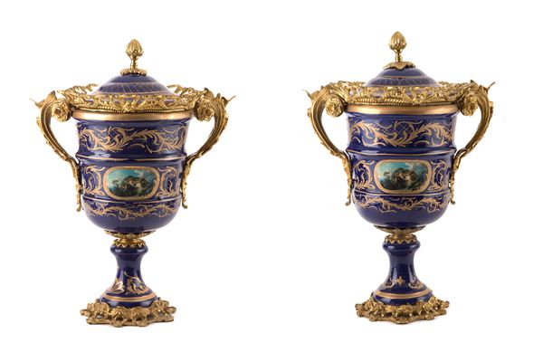 Pair of blue and gold porcelain vases