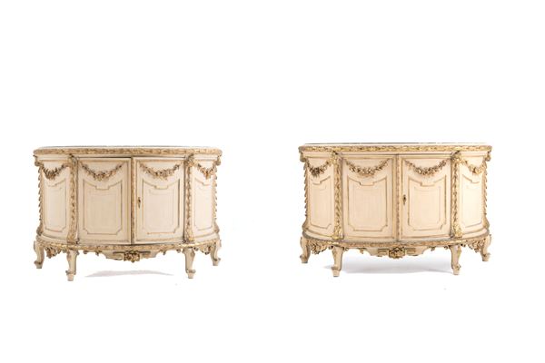 Pair of lacquered sideboards with marble tops