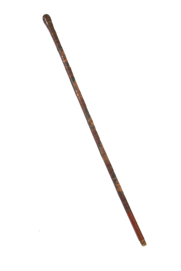 Carved and lacquered stick