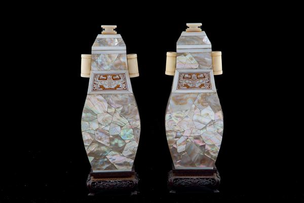 Pair of wooden vases covered in mother of pearl