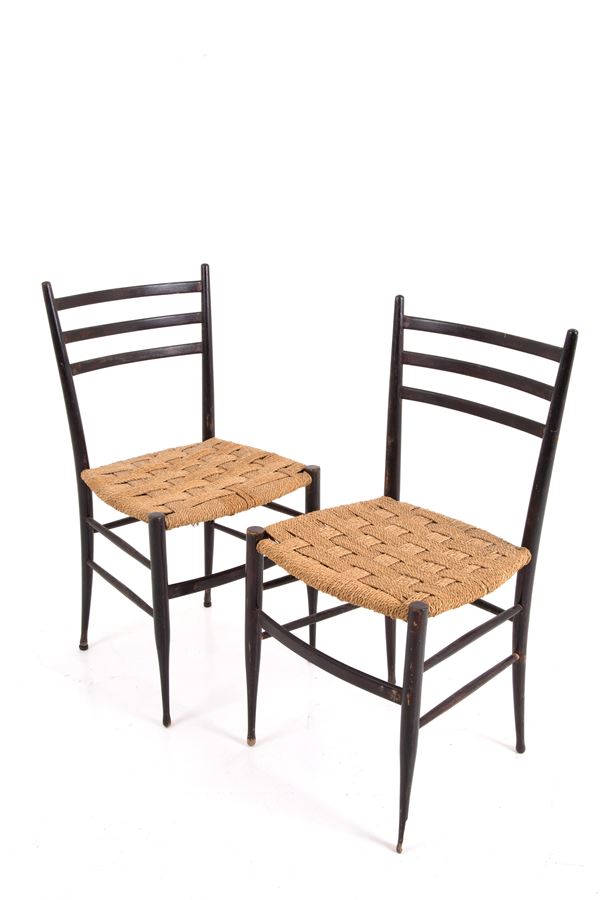 GIO PONTI - Two stained wooden chairs