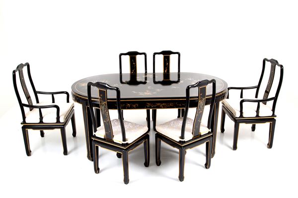 Table with four chairs and two armchairs