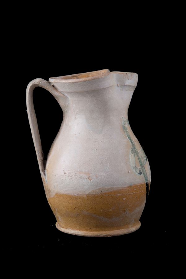 Majolica jug with coat of arms