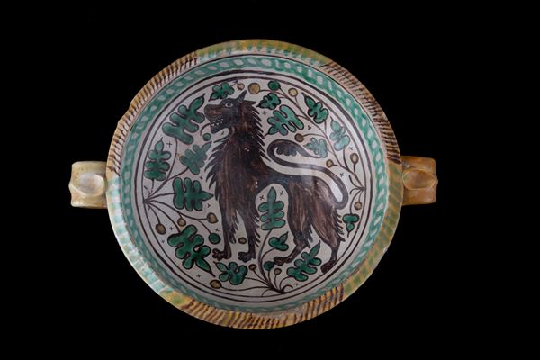 Majolica cup with lion