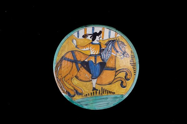 Piatto in maiolica con cavaliere