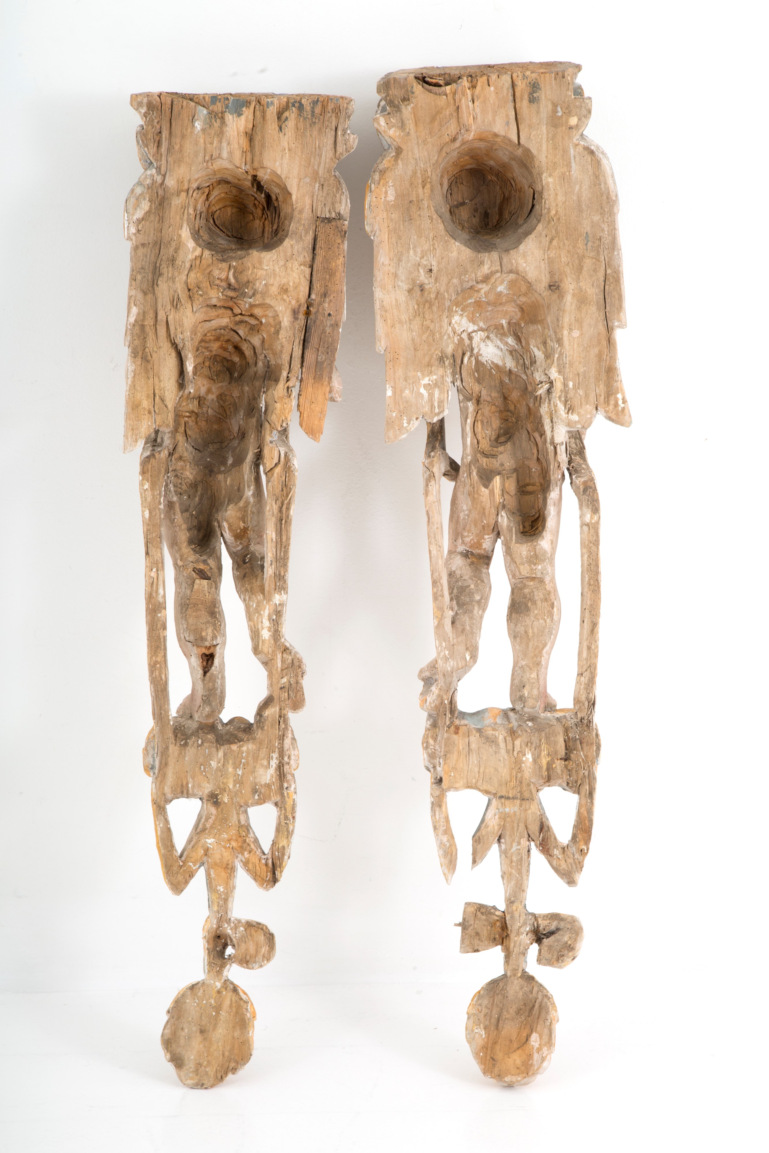 Coppia di cariatidi con putti