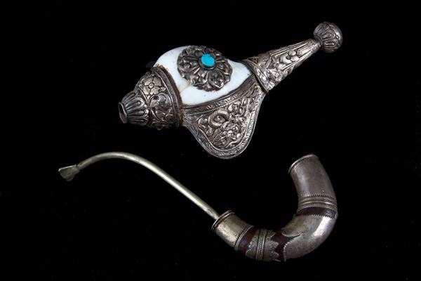 Silver and shell pipe