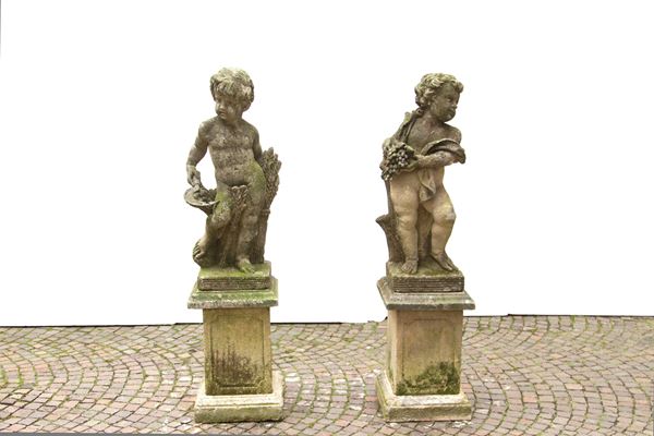 Coppia di sculture da giardino "PUTTI ALLEGORICI"