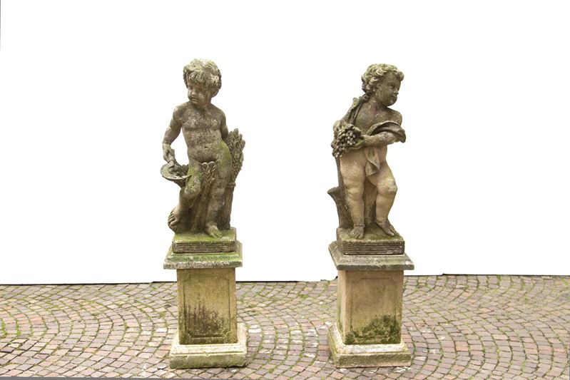 Coppia di Sculture da Giardino "putti Allegorici"
