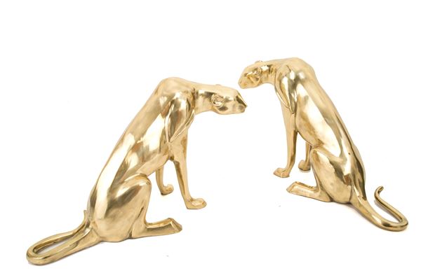 Two sculptures "STYLIZED JAGUARS"