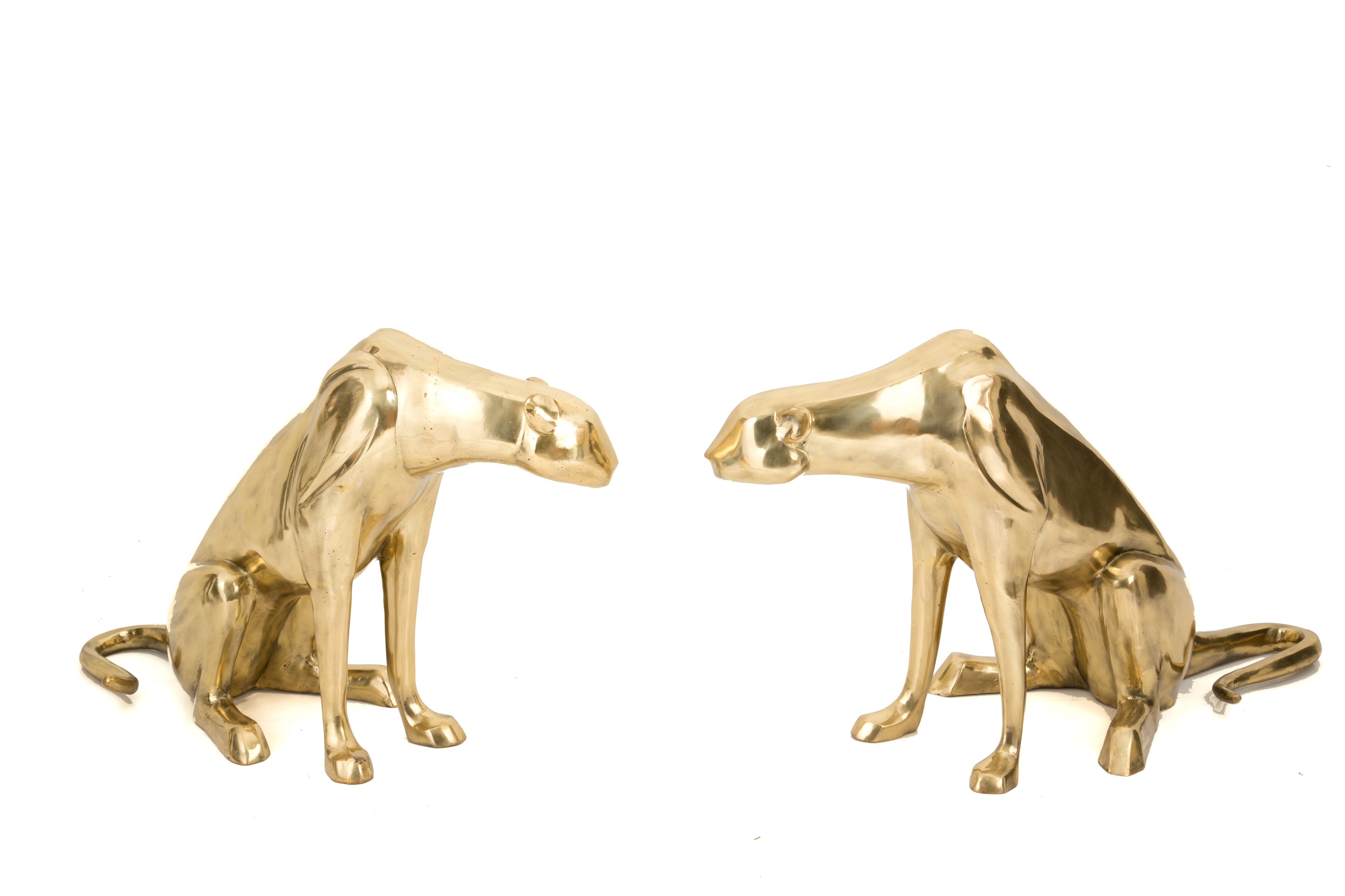 Due Sculture "giaguari Stilizzati"