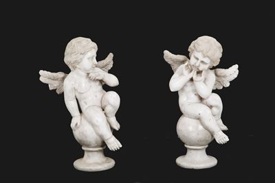 Due Sculture "angeli Seduti su Sfere"
