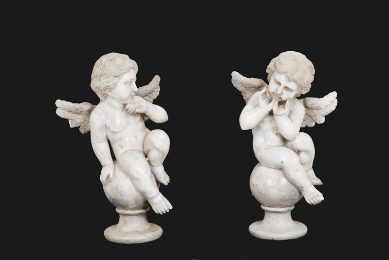 Due Sculture "angeli Seduti su Sfere"