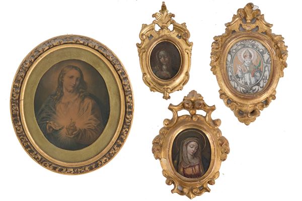 Quattro cornici intagliate e dorate