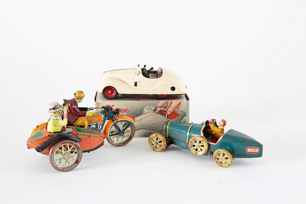 Three tin toys
