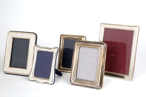 Five silver photo frames