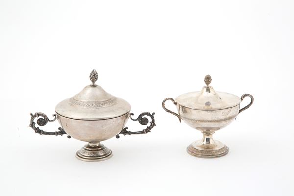 Two silver sugar bowls